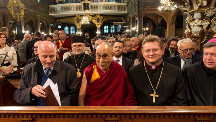 His Holiness the Dalai Lama sitting in the front row of the Church of Peace in Swidnica, Poland on September 21, 2016. Photo/Maciej Kulczynski His Holiness the Dalai Lama sitting in the front row of the Church of Peace in Swidnica, Poland on September 21, 2016. Photo/Maciej Kulczynski