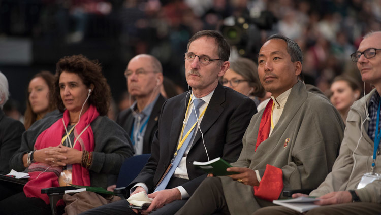 Members of the audience listening to His Holiness the Dalai Lama speaking at the Hallenstadion in Zurich, Switzerland on October 14, 2016. Photo/Manuel Bauer Members of the audience listening to His Holiness the Dalai Lama speaking at the Hallenstadion in Zurich, Switzerland on October 14, 2016. Photo/Manuel Bauer