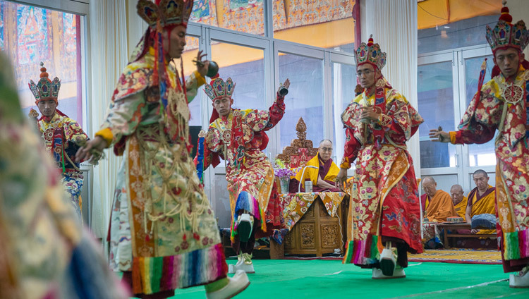 His Holiness the Dalai Lama looks on as monks from Namgyal Monastery perform the Earth Ritual Dance on the second day of preparations for the Kalachakra Empowerment in Bodhgaya, Bihar, India on January 3, 2017. Photo/Tenzin Choejor/OHHDL His Holiness the Dalai Lama looks on as monks from Namgyal Monastery perform the Earth Ritual Dance on the second day of preparations for the Kalachakra Empowerment in Bodhgaya, Bihar, India on January 3, 2017. Photo/Tenzin Choejor/OHHDL