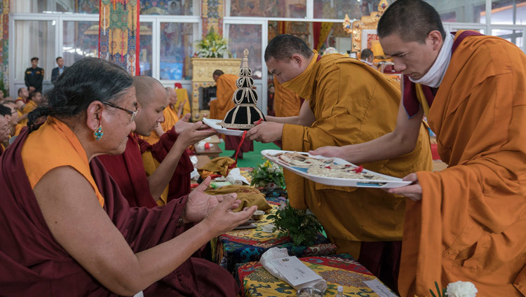 Monks from Namgyal Monastery presenting ritual objects to Sakya Trizin and Gyalwang Karmapa during the third and final day of the actual Kalachakra Empowerment in Bodhgaya, Bihar, India on January 13, 2017. Photo/Tenzin Choejor/OHHDL Monks from Namgyal Monastery presenting ritual objects to Sakya Trizin and Gyalwang Karmapa during the third and final day of the actual Kalachakra Empowerment in Bodhgaya, Bihar, India on January 13, 2017. Photo/Tenzin Choejor/OHHDL
