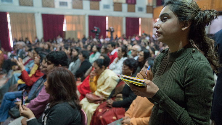 A student taking notes as His Holiness the Dalai Lama answers her question during his talk at Jesus & Mary College in New Delhi, India on February 7, 2017. Photo/Tenzin Choejor/OHHDL A student taking notes as His Holiness the Dalai Lama answers her question during his talk at Jesus & Mary College in New Delhi, India on February 7, 2017. Photo/Tenzin Choejor/OHHDL