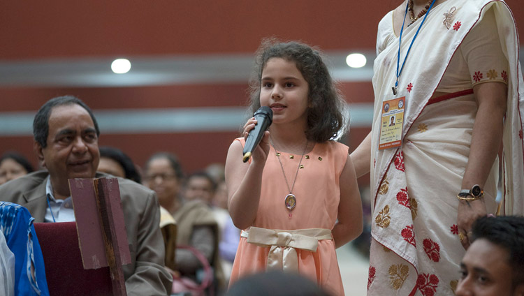 A young member of the audience asking His Holiness the Dalai Lama a question during his talk at Guwahati University Auditorium in Guwahati, Assam, India on April 2, 2017. Photo by Tenzin Choejor/OHHDL A young member of the audience asking His Holiness the Dalai Lama a question during his talk at Guwahati University Auditorium in Guwahati, Assam, India on April 2, 2017. Photo by Tenzin Choejor/OHHDL