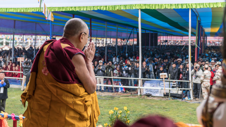 His Holiness the Dalai Lama saluting the crowd of 15,000 on his arrival at Buddha Park in Bomdila, AP, India on April 5, 2017. Photo by Tenzin Choejor/OHHDL His Holiness the Dalai Lama saluting the crowd of 15,000 on his arrival at Buddha Park in Bomdila, AP, India on April 5, 2017. Photo by Tenzin Choejor/OHHDL