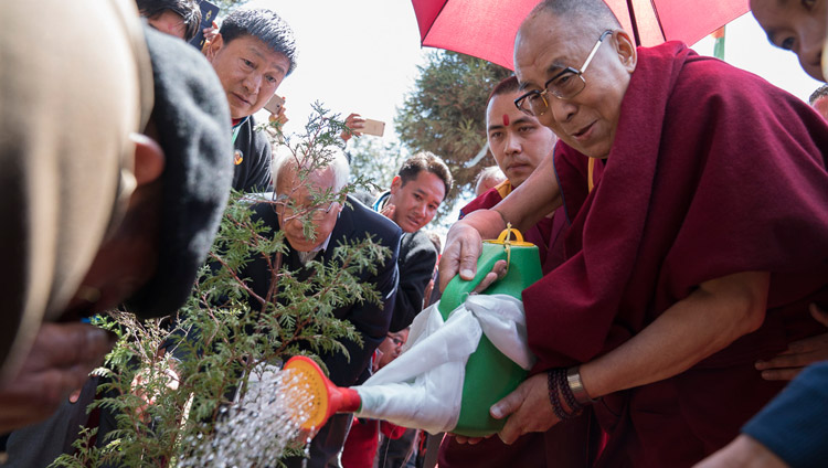 His Holiness the Dalai Lama planting a tree to inaugurate the project to plant 100,000 saplings at the conclusion of his teachings at the Yiga Choezin teaching ground in Tawang, Arunachal Pradesh, India on April 10, 2017. Photo by Tenzin Choejor/OHHDL His Holiness the Dalai Lama planting a tree to inaugurate the project to plant 100,000 saplings at the conclusion of his teachings at the Yiga Choezin teaching ground in Tawang, Arunachal Pradesh, India on April 10, 2017. Photo by Tenzin Choejor/OHHDL