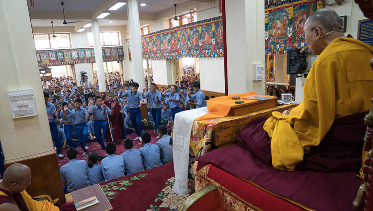 His Holiness the Dalai Lama looks on as young students engage in Buddhist philosophical debate during the second day of his teaching for Tibetan youth at the Main Tibetan Temple in Dharamsala, HP, India on June 6, 2017. Photo by Tenzin Choejor/OHHDL His Holiness the Dalai Lama looks on as young students engage in Buddhist philosophical debate during the second day of his teaching for Tibetan youth at the Main Tibetan Temple in Dharamsala, HP, India on June 6, 2017. Photo by Tenzin Choejor/OHHDL