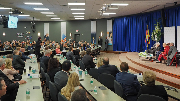 A member of the audience asking the panel members a question during the discussion on compassion with His Holiness the Dalai Lama at the Starkey Campus in Minneapolis, MN, USA on June 23, 2017. Photo by Jeremy Russell/OHHDL A member of the audience asking the panel members a question during the discussion on compassion with His Holiness the Dalai Lama at the Starkey Campus in Minneapolis, MN, USA on June 23, 2017. Photo by Jeremy Russell/OHHDL