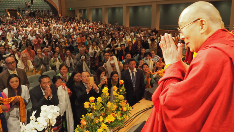 His Holiness the Dalai Lama thanking the gathering at the conclusion of his meeting with the Tibetan community in Minneapolis, MN, USA on June 24, 2017. Photo by Jeremy Russell/OHHDL His Holiness the Dalai Lama thanking the gathering at the conclusion of his meeting with the Tibetan community in Minneapolis, MN, USA on June 24, 2017. Photo by Jeremy Russell/OHHDL