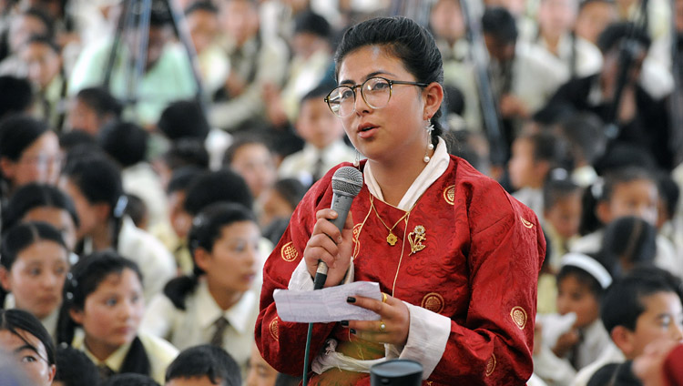 A student asking His Holiness the Dalai Lama a question during his talk at Ladakh Public School in Leh, Ladakh, J&K, India on July 8, 2017. Photo by Lobsang Tsering/OHHDL A student asking His Holiness the Dalai Lama a question during his talk at Ladakh Public School in Leh, Ladakh, J&K, India on July 8, 2017. Photo by Lobsang Tsering/OHHDL