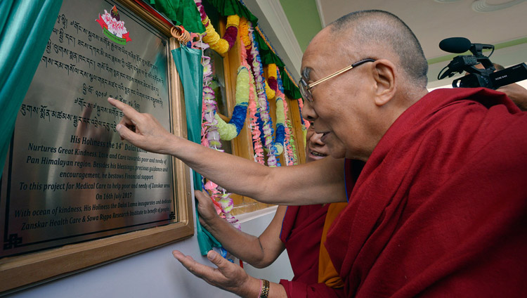 His Holiness the Dalai Lama unveiling a plaque marking the Zanskar Health Care & Sowa Rigpa Research Institute inauguration in Padum, Zanskar, J&K, India on July 16, 2017. Photo by Lobsang Tsering/OHHDL His Holiness the Dalai Lama unveiling a plaque marking the Zanskar Health Care & Sowa Rigpa Research Institute inauguration in Padum, Zanskar, J&K, India on July 16, 2017. Photo by Lobsang Tsering/OHHDL