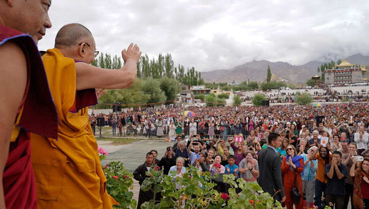 His Holiness the Dalai Lama waving to the westerners attending the second day of his teachings at the Shiwatsel teaching ground in Leh, Ladakh, J&K, India on July 29, 2017. Photo by Tenzin Choejor/OHHDL His Holiness the Dalai Lama waving to the westerners attending the second day of his teachings at the Shiwatsel teaching ground in Leh, Ladakh, J&K, India on July 29, 2017. Photo by Tenzin Choejor/OHHDL