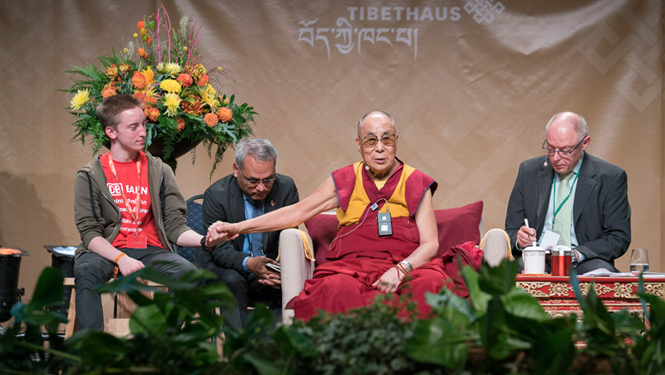 His Holiness the Dalai Lama answering questions from students during their dialogue at the Jahrhunderthalle in Frankfurt, Germany on September 13, 2017. Photo by Tenzin Choejor His Holiness the Dalai Lama answering questions from students during their dialogue at the Jahrhunderthalle in Frankfurt, Germany on September 13, 2017. Photo by Tenzin Choejor