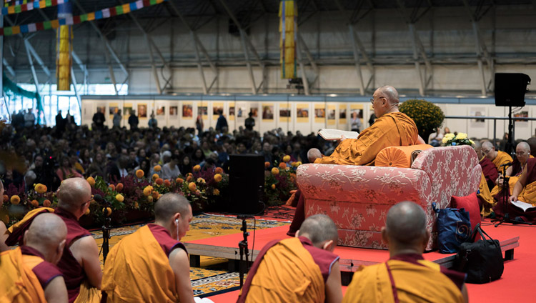 Members of the monastic community sitting on stage with His Holiness the Dalai Lama during his teachings at Skonto Hall in Riga, Latvia on September 23, 2017. Photo by Tenzin Choejor Members of the monastic community sitting on stage with His Holiness the Dalai Lama during his teachings at Skonto Hall in Riga, Latvia on September 23, 2017. Photo by Tenzin Choejor