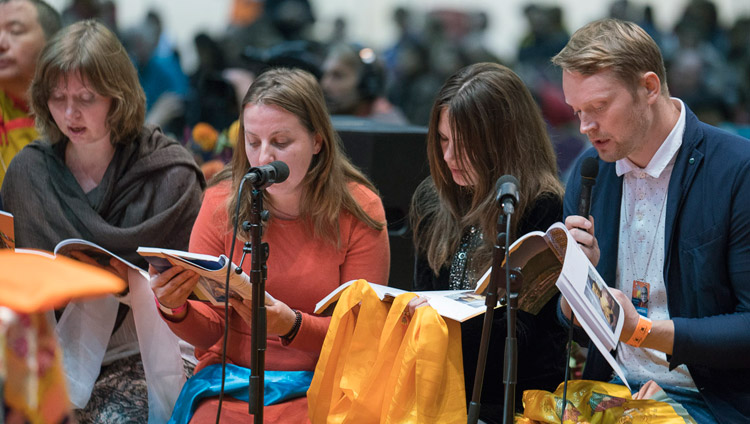 A group of Russina buddhists reciting the Heart Sutra in Russian at the start of His Holiness the Dalai Lama's teaching in Riga, Latvia on September 23, 2017. Photo by Tenzin Choejor A group of Russina buddhists reciting the Heart Sutra in Russian at the start of His Holiness the Dalai Lama's teaching in Riga, Latvia on September 23, 2017. Photo by Tenzin Choejor