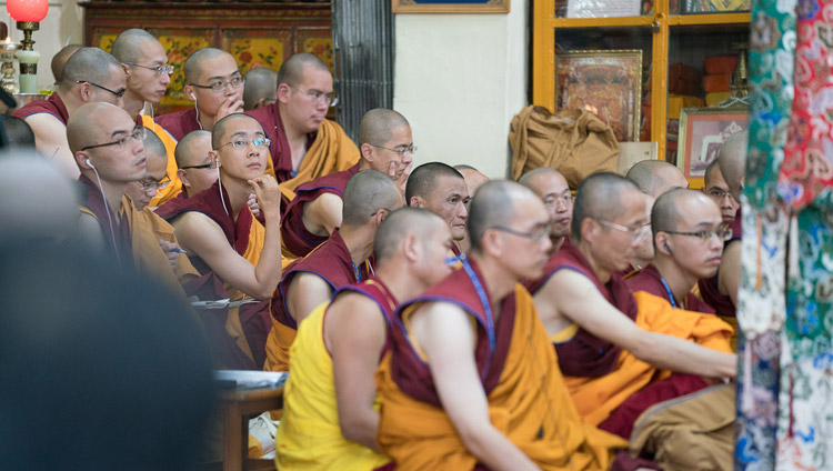 Monastics from Taiwan listening to the Chinese translation on FM radios of His Holiness the Dalai Lama'a teaching at the Tsuglagkhang in Dharamsala, HP, India on October 3, 2017. Photo by Tenzin Choejor Monastics from Taiwan listening to the Chinese translation on FM radios of His Holiness the Dalai Lama'a teaching at the Tsuglagkhang in Dharamsala, HP, India on October 3, 2017. Photo by Tenzin Choejor