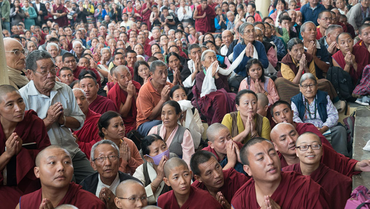 Many of the more the more than 6000 people attending His Holiness the Dalai Lama's second day of teachings waiting in the courtyard to pay their respects as he departs from the Tsuglagkhang in Dharamsala, HP, India on October 4, 2017. Photo by Tenzin Choejor Many of the more the more than 6000 people attending His Holiness the Dalai Lama's second day of teachings waiting in the courtyard to pay their respects as he departs from the Tsuglagkhang in Dharamsala, HP, India on October 4, 2017. Photo by Tenzin Choejor