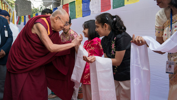 His Holiness the Dalai Lama greeting students on his arrival at Salwan Public School in Delhi, India on November 18, 2017. Photo by Tenzin Choejor His Holiness the Dalai Lama greeting students on his arrival at Salwan Public School in Delhi, India on November 18, 2017. Photo by Tenzin Choejor
