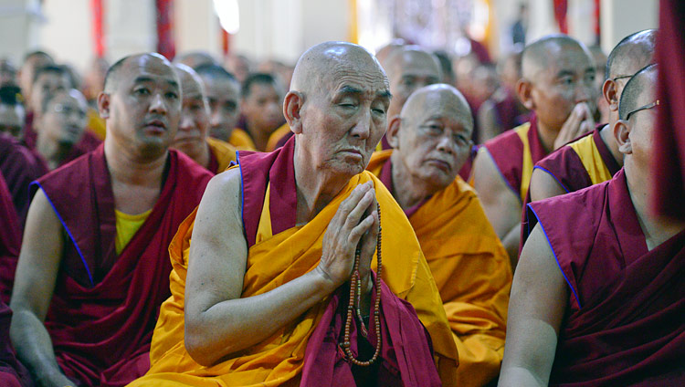 Monks in the audience listening to His Holiness the Dalai Lama during his teaching at Ganden Lachi Monastery in Mundgod, Karnataka, India on December 17, 2017. Photo by Lobsang Tsering Monks in the audience listening to His Holiness the Dalai Lama during his teaching at Ganden Lachi Monastery in Mundgod, Karnataka, India on December 17, 2017. Photo by Lobsang Tsering