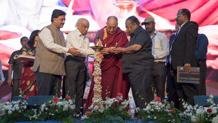 His Holiness the Dalai Lama joins in lighting a lamp at the start of the Seshadripuram Group of Institutions Silver Jubilee in Bengaluru, Karnataka, India on December 24, 2017. Photo by Lobsang Tsering His Holiness the Dalai Lama joins in lighting a lamp at the start of the Seshadripuram Group of Institutions Silver Jubilee in Bengaluru, Karnataka, India on December 24, 2017. Photo by Lobsang Tsering
