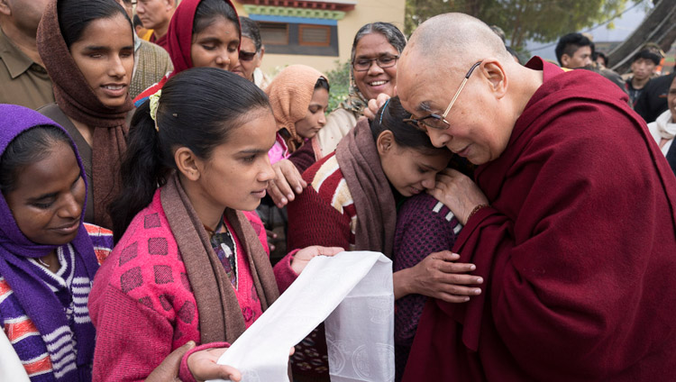 His Holiness the Dalai Lama with a group of blind and partially sighted women and girls from the nearby Jeevan Jyoti school outside the venue at the conclusion of the conference on Mind in Indian Philosophical Schools of Thought and Modern Science at the Central Institute of Higher Tibetan Studies in Sarnath, Varanasi, India on December 31, 2017. Photo by Lobsang Tsering His Holiness the Dalai Lama with a group of blind and partially sighted women and girls from the nearby Jeevan Jyoti school outside the venue at the conclusion of the conference on Mind in Indian Philosophical Schools of Thought and Modern Science at the Central Institute of Higher Tibetan Studies in Sarnath, Varanasi, India on December 31, 2017. Photo by Lobsang Tsering