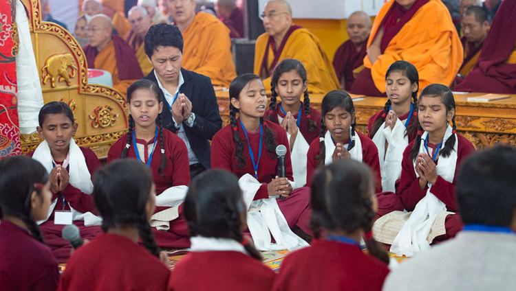 School children reciting the Heart Sutra in Sanskrit at the start of His Holiness the Dalai Lama's teaching in Bodhgaya, Bihar, India on January 5, 2018. Photo by Lobsang Tsering School children reciting the Heart Sutra in Sanskrit at the start of His Holiness the Dalai Lama's teaching in Bodhgaya, Bihar, India on January 5, 2018. Photo by Lobsang Tsering