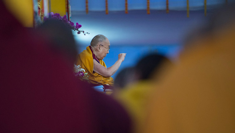 His Holiness the Dalai Lama speaking on the first day of his teachings at the Kalachakra Maidan in Bodhgaya, Bihar, India on January 5, 2018. Photo by Lobsang Tsering His Holiness the Dalai Lama speaking on the first day of his teachings at the Kalachakra Maidan in Bodhgaya, Bihar, India on January 5, 2018. Photo by Lobsang Tsering
