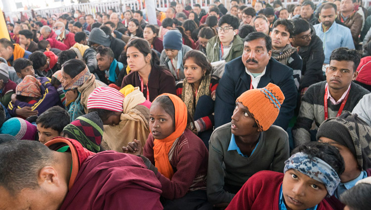 Members of the audience listening to His Holiness the Dalai Lama on the third day of teachings in Bodhgaya, Bihar, India on January 7, 2018. Photo by Lobsang Tsering Members of the audience listening to His Holiness the Dalai Lama on the third day of teachings in Bodhgaya, Bihar, India on January 7, 2018. Photo by Lobsang Tsering
