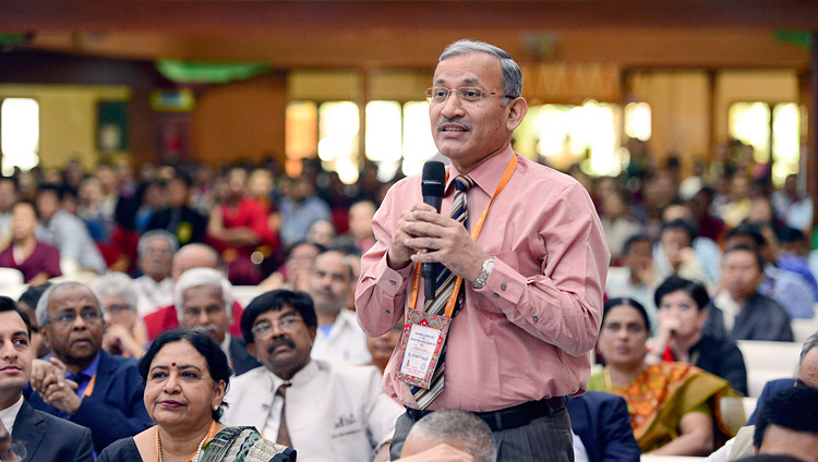 One of the Vice-Chancellors in the audience asking His Holiness the Dalai Lama a question on the second day of the Association of Indian Universities’ Meet at Sarnath, UP, India on March 20, 2018. Photo by Lobsang Tsering One of the Vice-Chancellors in the audience asking His Holiness the Dalai Lama a question on the second day of the Association of Indian Universities’ Meet at Sarnath, UP, India on March 20, 2018. Photo by Lobsang Tsering