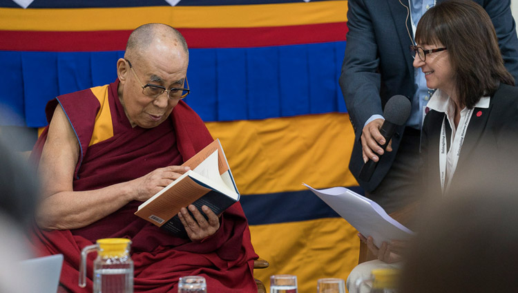 Susan Bauer-Wu, President of the Mind & Life Institute, presenting His His Holiness the Dalai Lama with a copy of ‘The Monastery and The Microscope’, a record of the dialogue that took place in Mundgod in 2013 on the opening day of the 33rd Mind & Life Conference in Dharamsala, HP, India on March 12, 2018. Photo by Tenzin Choejor Susan Bauer-Wu, President of the Mind & Life Institute, presenting His His Holiness the Dalai Lama with a copy of ‘The Monastery and The Microscope’, a record of the dialogue that took place in Mundgod in 2013 on the opening day of the 33rd Mind & Life Conference in Dharamsala, HP, India on March 12, 2018. Photo by Tenzin Choejor