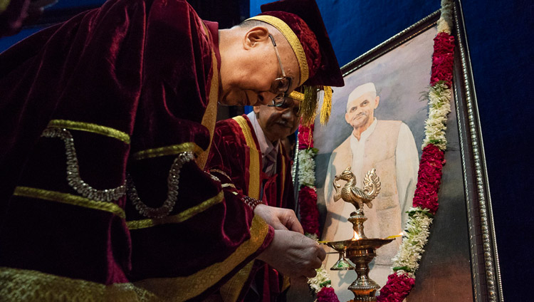 His Holiness the Dalai Lama lighting a lamp and offering flowers before a portrait of Lal Bahadur Shastri at the start of the Lal Bahadur Shastri Institute of Management Convocation in New Delhi, India on April 23, 2018. Photo by Tenzin Choejor His Holiness the Dalai Lama lighting a lamp and offering flowers before a portrait of Lal Bahadur Shastri at the start of the Lal Bahadur Shastri Institute of Management Convocation in New Delhi, India on April 23, 2018. Photo by Tenzin Choejor