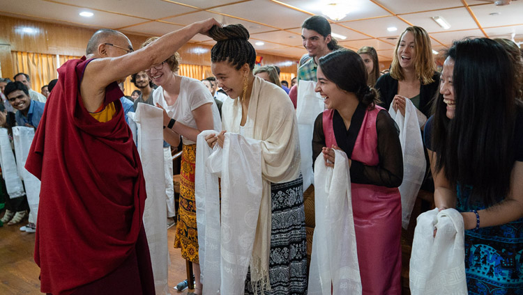 His Holiness the Dalai Lama greeting members of the audience before his meeting with students and teachers at his residence in Dharamsala, HP, India on June 1, 2018. Photo by Tenzin Choejor His Holiness the Dalai Lama greeting members of the audience before his meeting with students and teachers at his residence in Dharamsala, HP, India on June 1, 2018. Photo by Tenzin Choejor