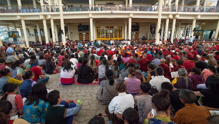 Many of the over 9,000 people attending His Holiness the Dalai Lama's teachings watching on TV screens in the Main Tibetan Temple courtyard in Dharamsala, HP, India on June 6, 2018. Photo by Tenzin Phuntsok Many of the over 9,000 people attending His Holiness the Dalai Lama's teachings watching on TV screens in the Main Tibetan Temple courtyard in Dharamsala, HP, India on June 6, 2018. Photo by Tenzin Phuntsok