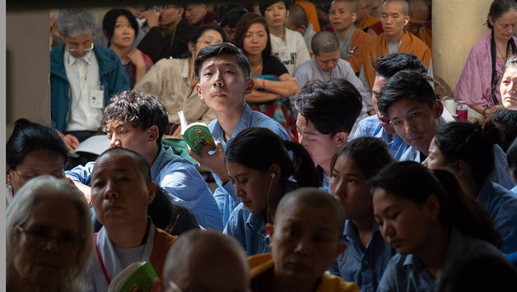 Tibetan students sitting on veranda at the Main Tibetan Temple listening to His Holiness the Dalai Lama during the second day of his teaching in Dharamsala, HP, India on June 7, 2018. Photo by Tenzin Phuntsok Tibetan students sitting on veranda at the Main Tibetan Temple listening to His Holiness the Dalai Lama during the second day of his teaching in Dharamsala, HP, India on June 7, 2018. Photo by Tenzin Phuntsok