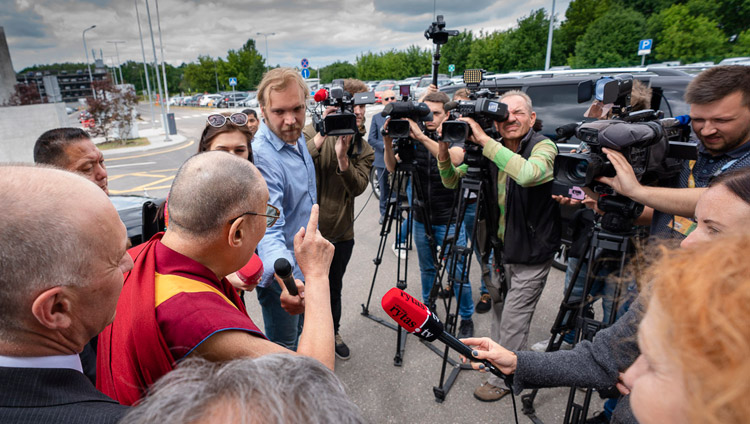 His Holiness the Dalai Lama answering questions from journalists at the airport in Vilnius, Lithuania on June 12, 2018. Photo by Tenzin Choejor His Holiness the Dalai Lama answering questions from journalists at the airport in Vilnius, Lithuania on June 12, 2018. Photo by Tenzin Choejor
