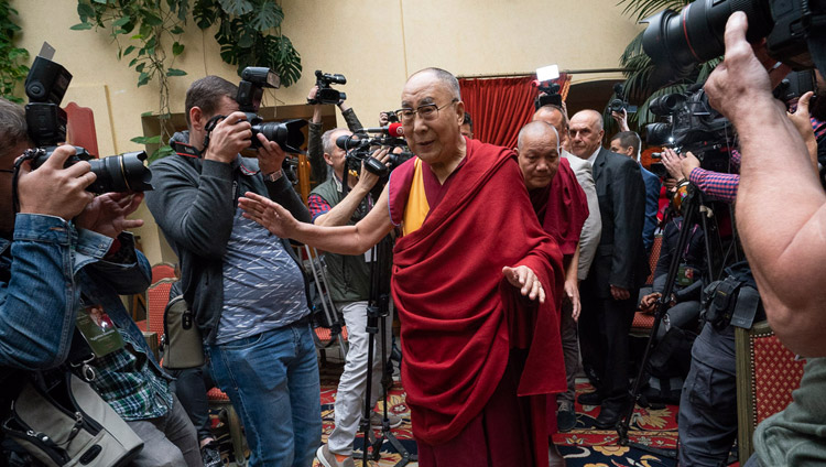 His Holiness the Dalai Lama greeting members of the media as he arrives for their meeting in Vilnius, Lithuania on June 13, 2018. Photo by Tenzin Choejor His Holiness the Dalai Lama greeting members of the media as he arrives for their meeting in Vilnius, Lithuania on June 13, 2018. Photo by Tenzin Choejor