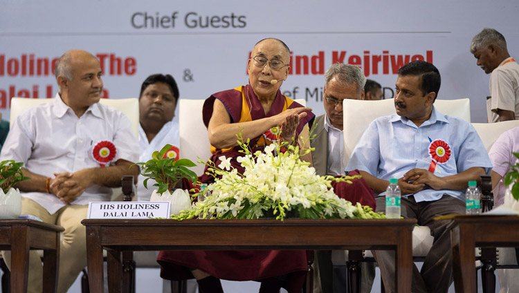 His Holiness the Dalai Lama answering questions from the audience during his talk at the Launch of the Happiness Curriculum in Delhi Government Schools in New Delhi, India on July 2, 2018. Photo by Tenzin Choejor His Holiness the Dalai Lama answering questions from the audience during his talk at the Launch of the Happiness Curriculum in Delhi Government Schools in New Delhi, India on July 2, 2018. Photo by Tenzin Choejor