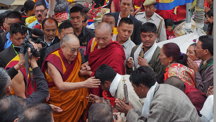 His Holiness the Dalai Lama interacting with members of the crowd gathered outside the Leh Jokhang as he prepares to depart for his residence in Leh, Ladakh, J&K, India on July 4, 2018. Photo by Jeremy Russell His Holiness the Dalai Lama interacting with members of the crowd gathered outside the Leh Jokhang as he prepares to depart for his residence in Leh, Ladakh, J&K, India on July 4, 2018. Photo by Jeremy Russell