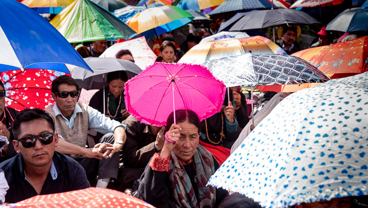 Members of the audience raising umbrellas against the sun during His Holiness the Dalai Lama's teaching in Diskit, Nubra Valley, J&K, India on July 13, 2018. Photo by Tenzin Choejor Members of the audience raising umbrellas against the sun during His Holiness the Dalai Lama's teaching in Diskit, Nubra Valley, J&K, India on July 13, 2018. Photo by Tenzin Choejor