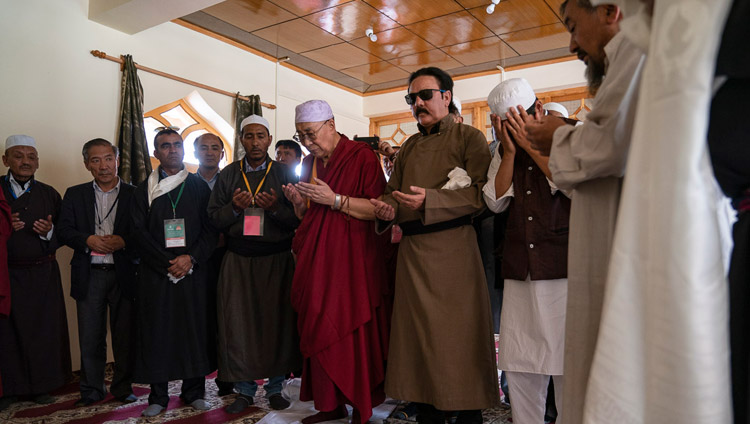 His Holiness the Dalai Lama joining in prayer at the Diskit Jama Masjid in Diskit, Nubra Valley, J&K, India on July 13, 2018. Photo by Tenzin Choejor His Holiness the Dalai Lama joining in prayer at the Diskit Jama Masjid in Diskit, Nubra Valley, J&K, India on July 13, 2018. Photo by Tenzin Choejor