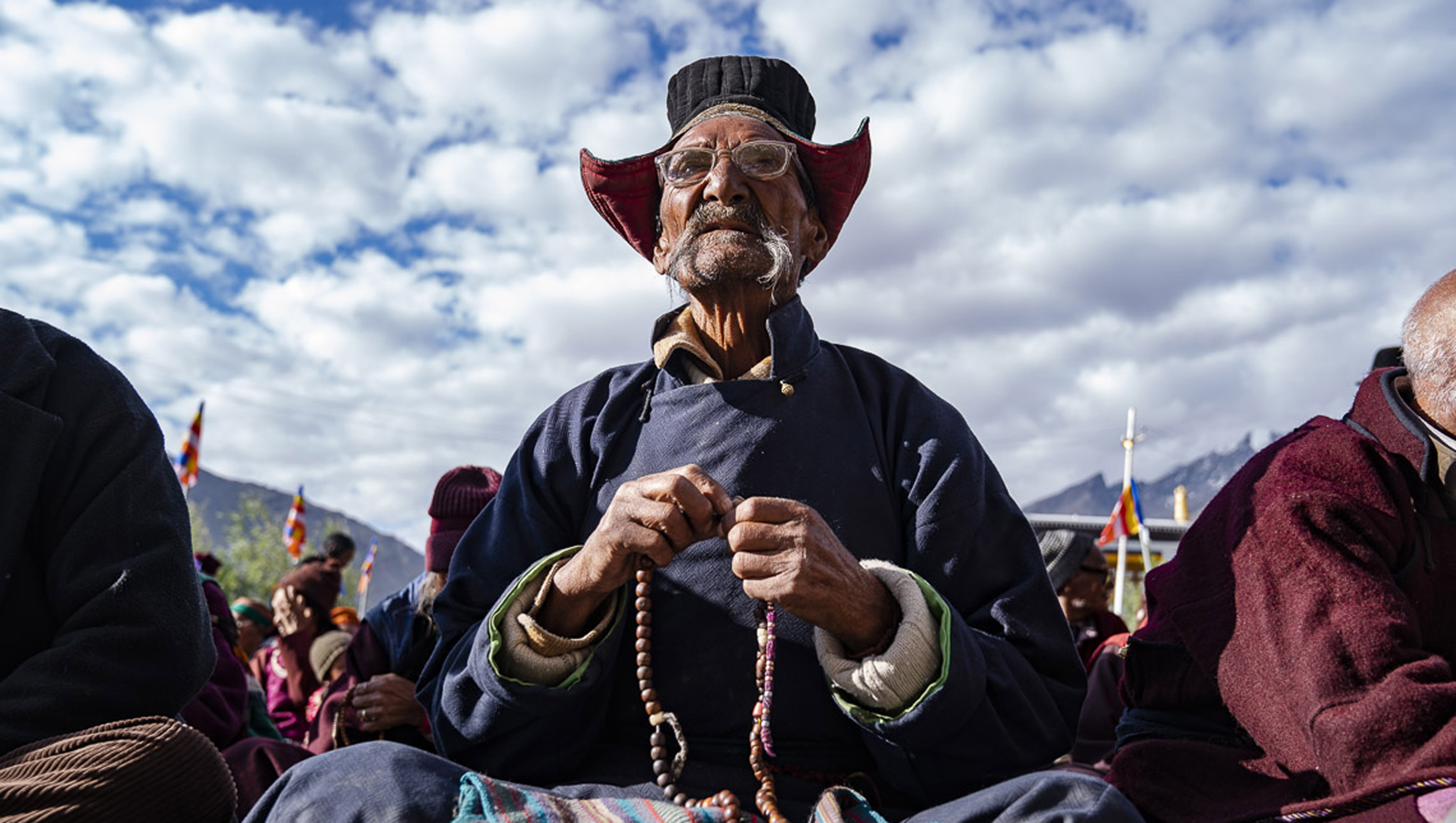 A member of the audience listening to His Holiness the Dalai Lama's teaching in Padum, Zanskar, J&K, India on July 22, 2018. Photo by Tenzin Choejor A member of the audience listening to His Holiness the Dalai Lama's teaching in Padum, Zanskar, J&K, India on July 22, 2018. Photo by Tenzin Choejor