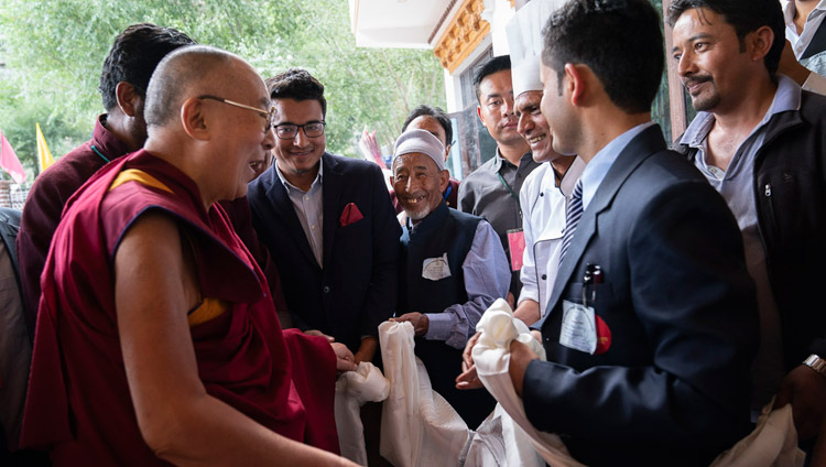 His Holiness the Dalai Lama thanking staff at his hotel after lunch on his first day in Kargil, Ladakh, J&K, India on July 25, 2018. Photo by Tenzin Choejor His Holiness the Dalai Lama thanking staff at his hotel after lunch on his first day in Kargil, Ladakh, J&K, India on July 25, 2018. Photo by Tenzin Choejor