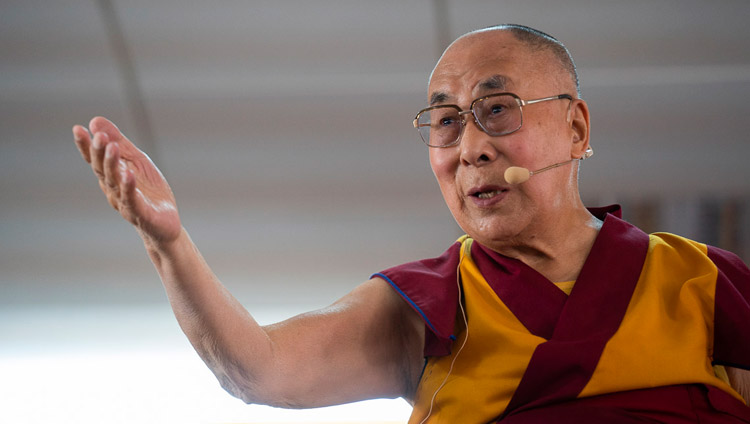 His Holiness the Dalai Lama gestures as he answers questions from the audience during his talk at Eliezer Joldan Memorial College in Leh, Ladakh, J&K, India on August 2, 2018. Photo by Tenzin Choejor His Holiness the Dalai Lama gestures as he answers questions from the audience during his talk at Eliezer Joldan Memorial College in Leh, Ladakh, J&K, India on August 2, 2018. Photo by Tenzin Choejor