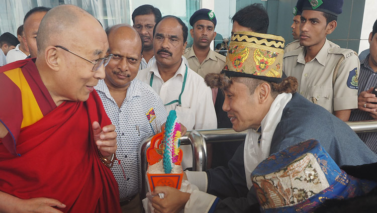 His Holiness the Dalai Lama receiving a traditional welcome on his arrival at the airport in Dabolim, Goa, India on August 7, 2018. Photo by Jeremy Russell His Holiness the Dalai Lama receiving a traditional welcome on his arrival at the airport in Dabolim, Goa, India on August 7, 2018. Photo by Jeremy Russell