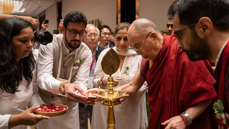 His Holiness the Dalai Lama lighting a lamp at to start his talk on 'Indian Wisdom and the Modern World' in Bengaluru, Karnataka, India on August 12, 2018. Photo by Tenzin Choejor His Holiness the Dalai Lama lighting a lamp at to start his talk on 'Indian Wisdom and the Modern World' in Bengaluru, Karnataka, India on August 12, 2018. Photo by Tenzin Choejor