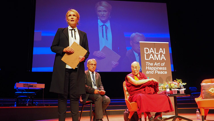 Swedish journalist and television presenter Kattis Ahlstrom introducing His Holiness the Dalai Lama at the start of the program at the Malmö Live in Malmö, Sweden on September 12, 2018. Photo by Jeremy Russell Swedish journalist and television presenter Kattis Ahlstrom introducing His Holiness the Dalai Lama at the start of the program at the Malmö Live in Malmö, Sweden on September 12, 2018. Photo by Jeremy Russell