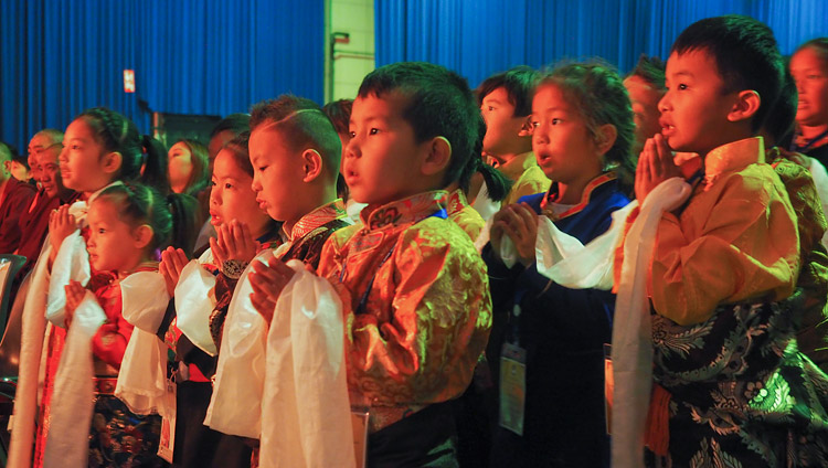 A group of young children singing a prayer for the long life of His Holiness the Dalai Lama at the start of his meeting with members of the Tibetan community at the Ahoy convention centre in Rotterdam, Netherlands on September 16, 2018. Photo by Jeremy Russell A group of young children singing a prayer for the long life of His Holiness the Dalai Lama at the start of his meeting with members of the Tibetan community at the Ahoy convention centre in Rotterdam, Netherlands on September 16, 2018. Photo by Jeremy Russell