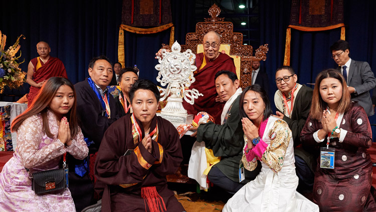 The Tibetan Community in the Netherlands presenting His Holiness the Dalai Lama with elaborate silver Dharma Wheel as token of gratitude at the conclusion of his meeting with Tibetans at the Ahoy convention centre in Rotterdam, Netherlands on September 16, 2018. Photo by Olivier Adams The Tibetan Community in the Netherlands presenting His Holiness the Dalai Lama with elaborate silver Dharma Wheel as token of gratitude at the conclusion of his meeting with Tibetans at the Ahoy convention centre in Rotterdam, Netherlands on September 16, 2018. Photo by Olivier Adams