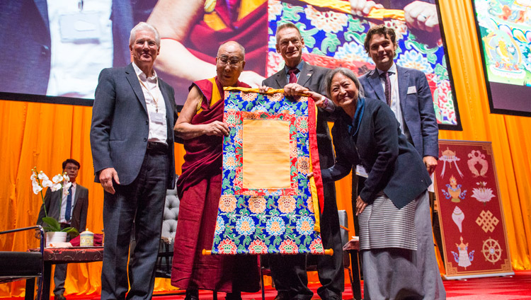 His Holiness the Dalai Lama and members of the International Campaign for Tibet (ICT) holding a certificate denoting the financial grant ICT will give to the Dalai Lama Institute for Higher Education as a gift of gratitude to His Holiness during their program at the Ahoy convention centre in Rotterdam, Netherlands on September 16, 2018. Photo by Jurjen Donkers His Holiness the Dalai Lama and members of the International Campaign for Tibet (ICT) holding a certificate denoting the financial grant ICT will give to the Dalai Lama Institute for Higher Education as a gift of gratitude to His Holiness during their program at the Ahoy convention centre in Rotterdam, Netherlands on September 16, 2018. Photo by Jurjen Donkers