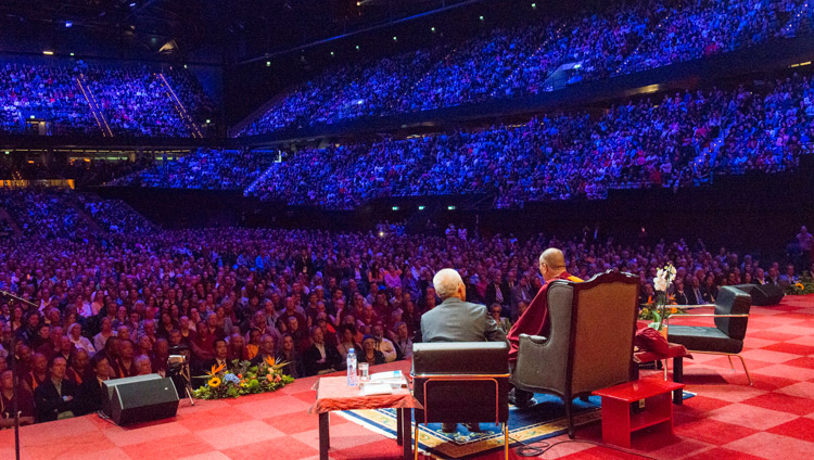 His Holiness the Dalai Lama addressing the capacity crowd of 12,000 at the Ahoy convention centre in Rotterdam, Netherlands on September 16, 2018. Photo by Jurjen Donkers His Holiness the Dalai Lama addressing the capacity crowd of 12,000 at the Ahoy convention centre in Rotterdam, Netherlands on September 16, 2018. Photo by Jurjen Donkers
