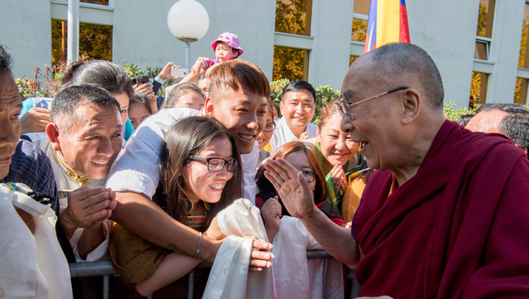 His Holiness the Dalai Lama interacting with members of the Tibetan community gathered at his hotel to welcome him on his arrival in Zurich, Switzerland on September 20, 2018. Photo by Manuel Bauer His Holiness the Dalai Lama interacting with members of the Tibetan community gathered at his hotel to welcome him on his arrival in Zurich, Switzerland on September 20, 2018. Photo by Manuel Bauer