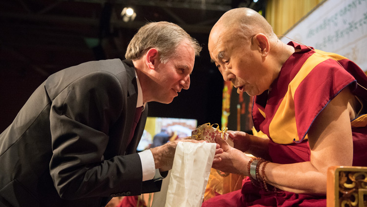 Philip Hepp, Managing Director of TIR, presenting His Holiness the Dalai Lama with a Swiss watch on behalf of the TIR foundation at the conclusion of Tibet Institute Rikon's 50th Anniversary Celebration in Winterthur, Switzerland on September 22, 2018. Photo by Manuel Bauer Philip Hepp, Managing Director of TIR, presenting His Holiness the Dalai Lama with a Swiss watch on behalf of the TIR foundation at the conclusion of Tibet Institute Rikon's 50th Anniversary Celebration in Winterthur, Switzerland on September 22, 2018. Photo by Manuel Bauer